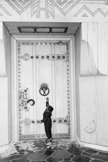 Black-and-white photograph: Child at Timberline Lodge, 1940s. Location: Mt. Hood, Oregon. Date: c. 1940s.