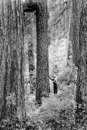 Black-and-white photograph: Man with Axe.