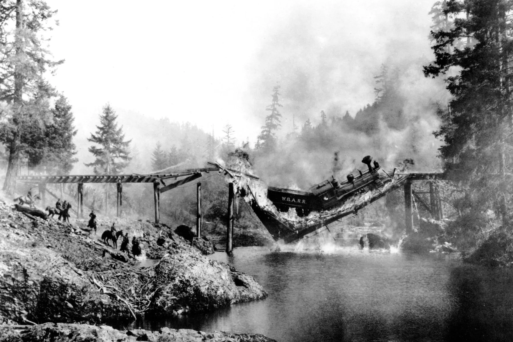 Black-and-white photograph: Train Wreck.