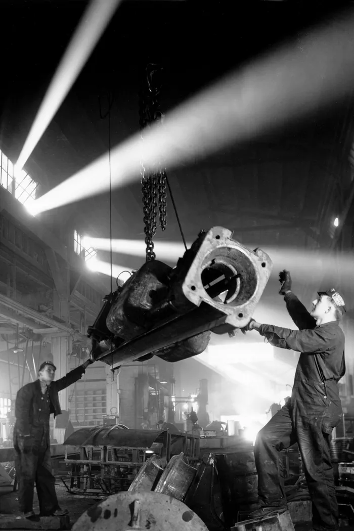 Black-and-white photograph: Monarch Forge.